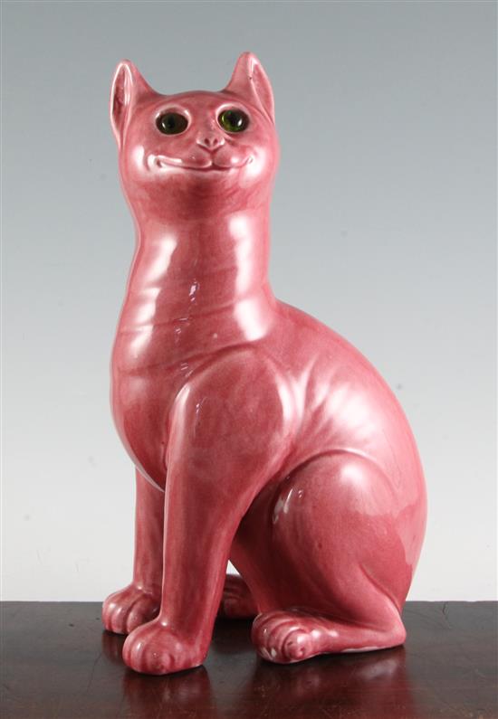 After Louis Wain. A Weymss pink glazed model of a seated cat, 32.5cm